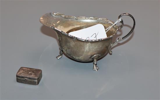 A George V silver sauceboat, Birmingham, 1929 and a modern silver pill box.